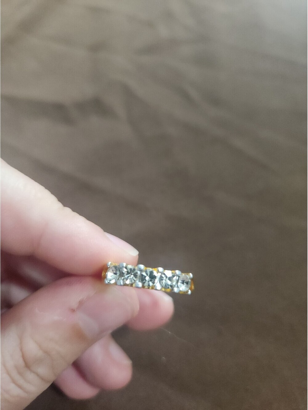 Elegant Gold Tone Ring with Clear Stones